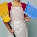 Woman Holding Broom and Dustpan